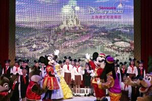 Walt Disney characters perform with children during a celebration held for the start of construction work on Shanghai Disneyland in April 2011.